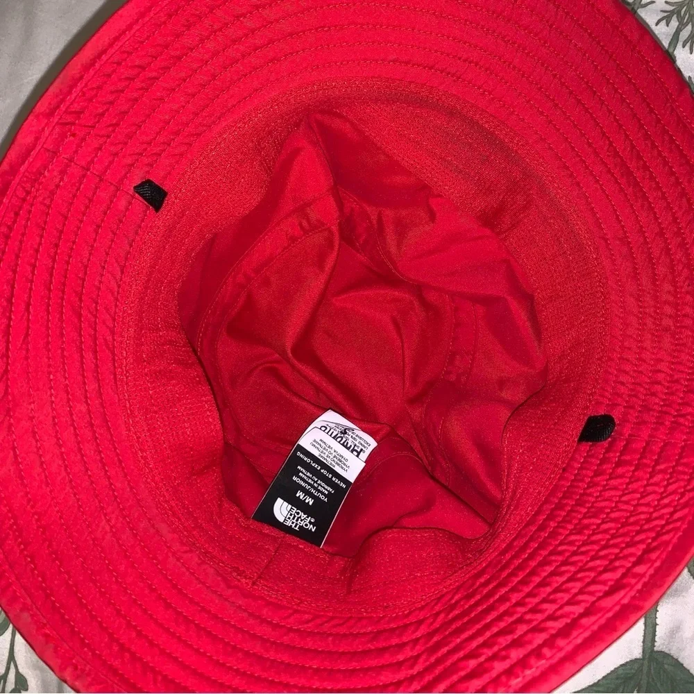 North face youth red bucket hat